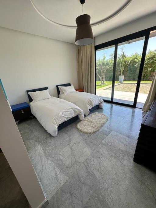 In Marrakech - 5 Suites, Heated Pool, Jacuzzi, Transportation, Volleyball & Padle Court, Complimentary Breakfast