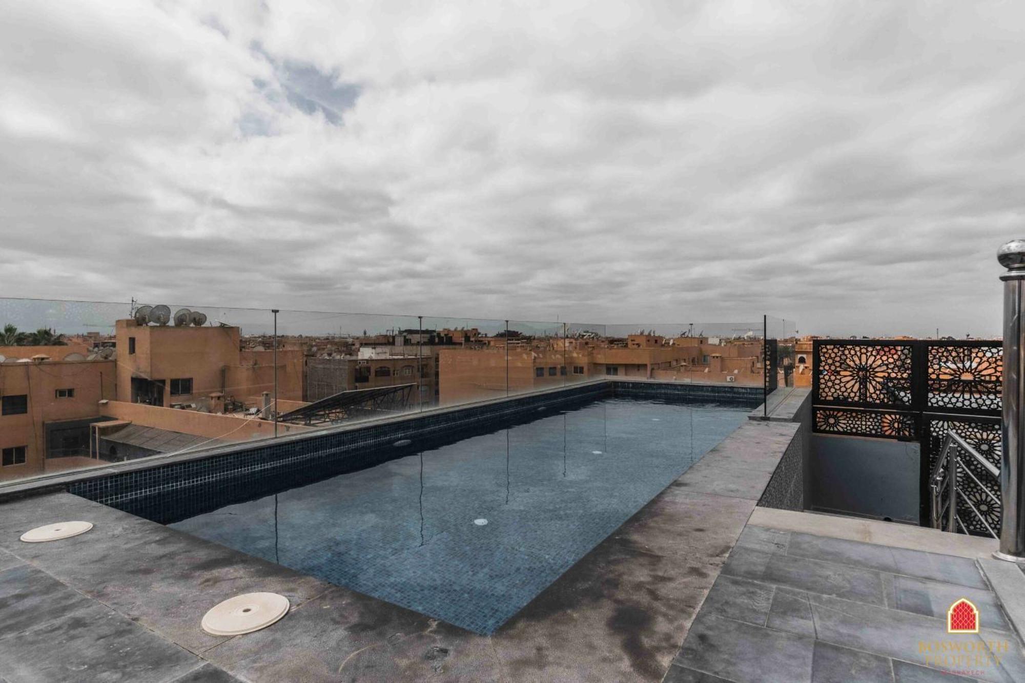 Apartamento Rooftop Pool, Bright & Cozy In City Center Marrakesh