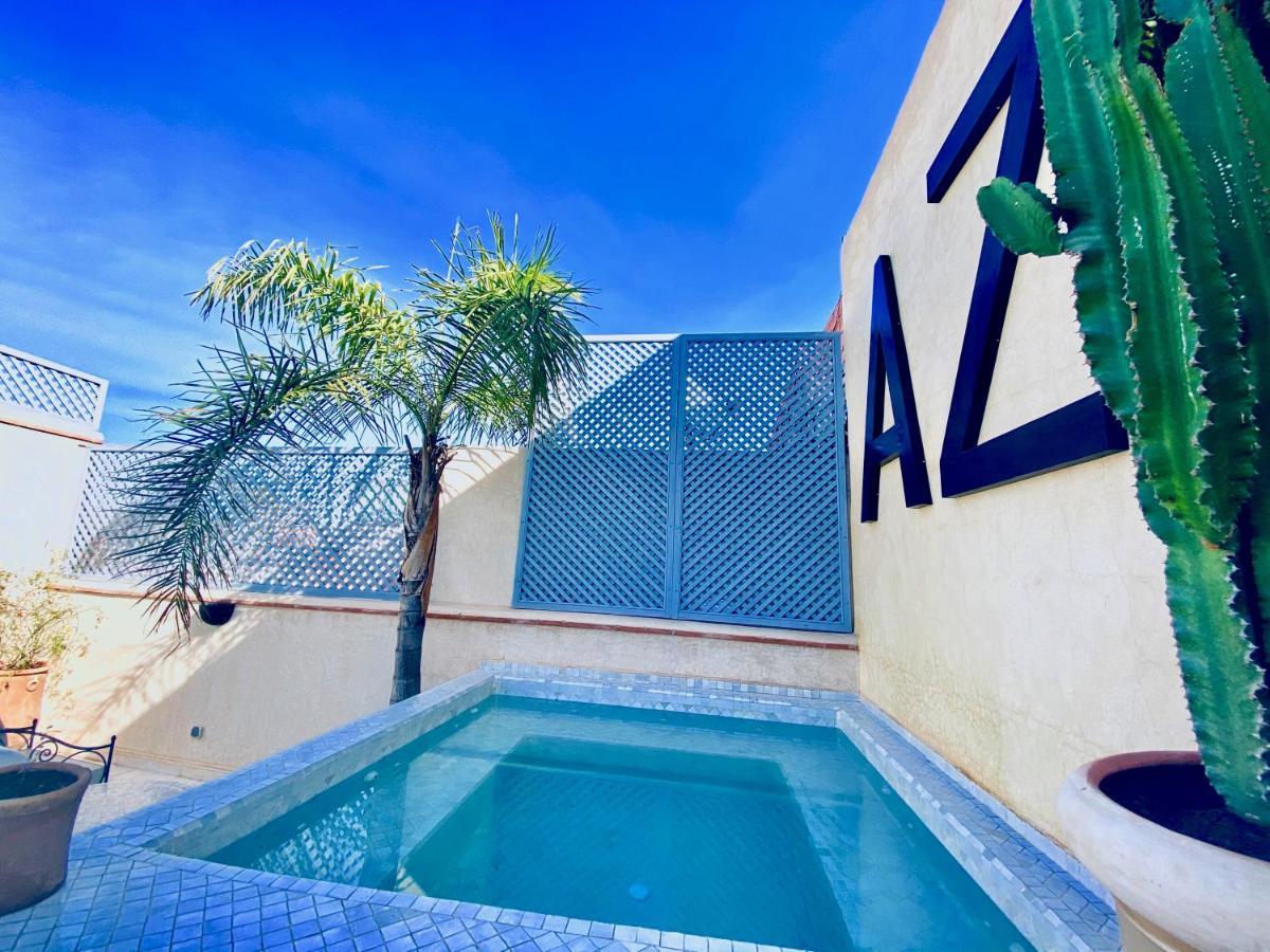 Riad Az *
