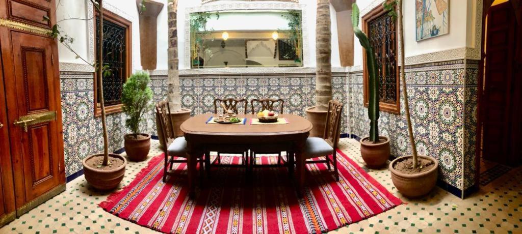 Riad Amely *