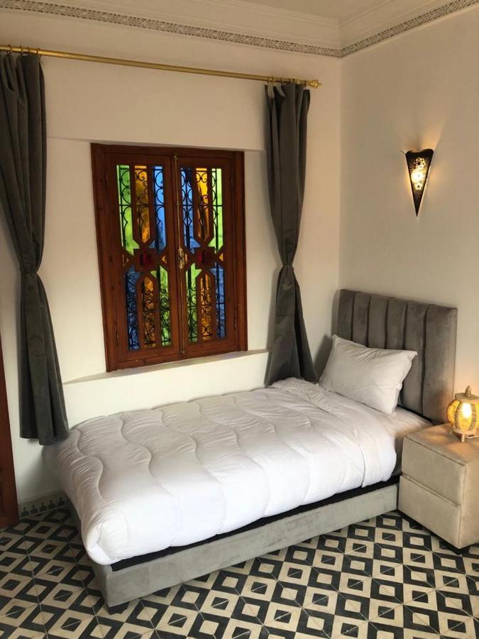 Riad Amely *