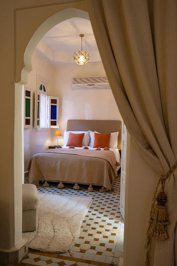 Riad Lamdina *