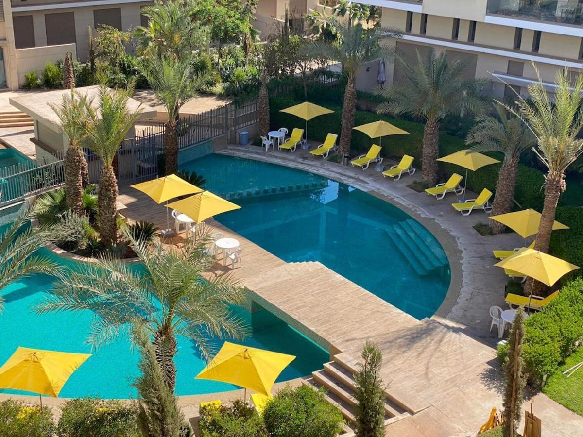 Apartamento Bel A Marrakech Dans La Pearl Garden Avec Piscine Situee Sur La Route De Casablanca Sa Grande Terrasse A Splendide Vue Sur La Et Les Montagnes De L'atlas A Quelques Minutes Du Centre Et Du Grand Stade De Marrakec Marraquexe